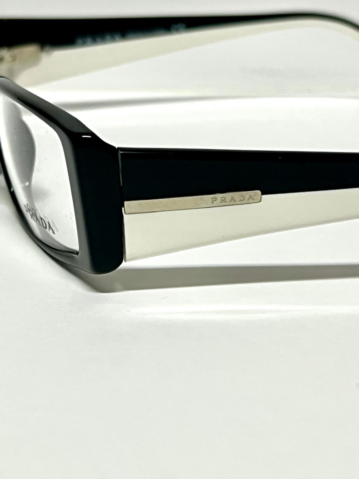 Prada VPR16H 7BH-1O1 occhiale da vista celluloide nero bianco dettaglio
