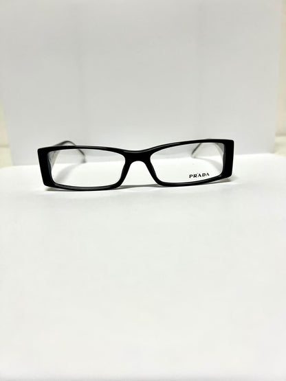 Prada VPR16H 7BH-1O1 occhiale da vista celluloide nero bianco fronte