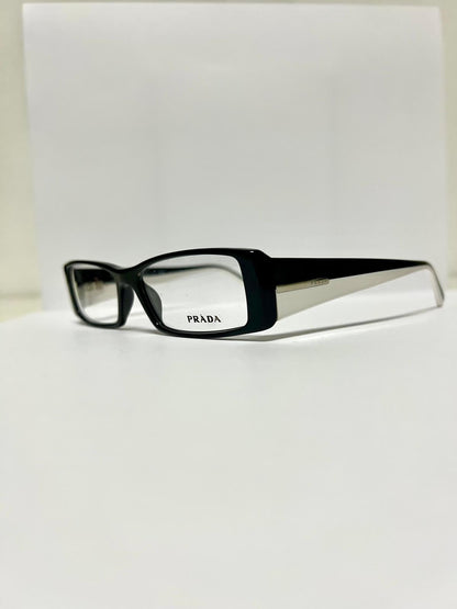 Prada VPR16H 7BH-1O1 occhiale da vista celluloide nero bianco