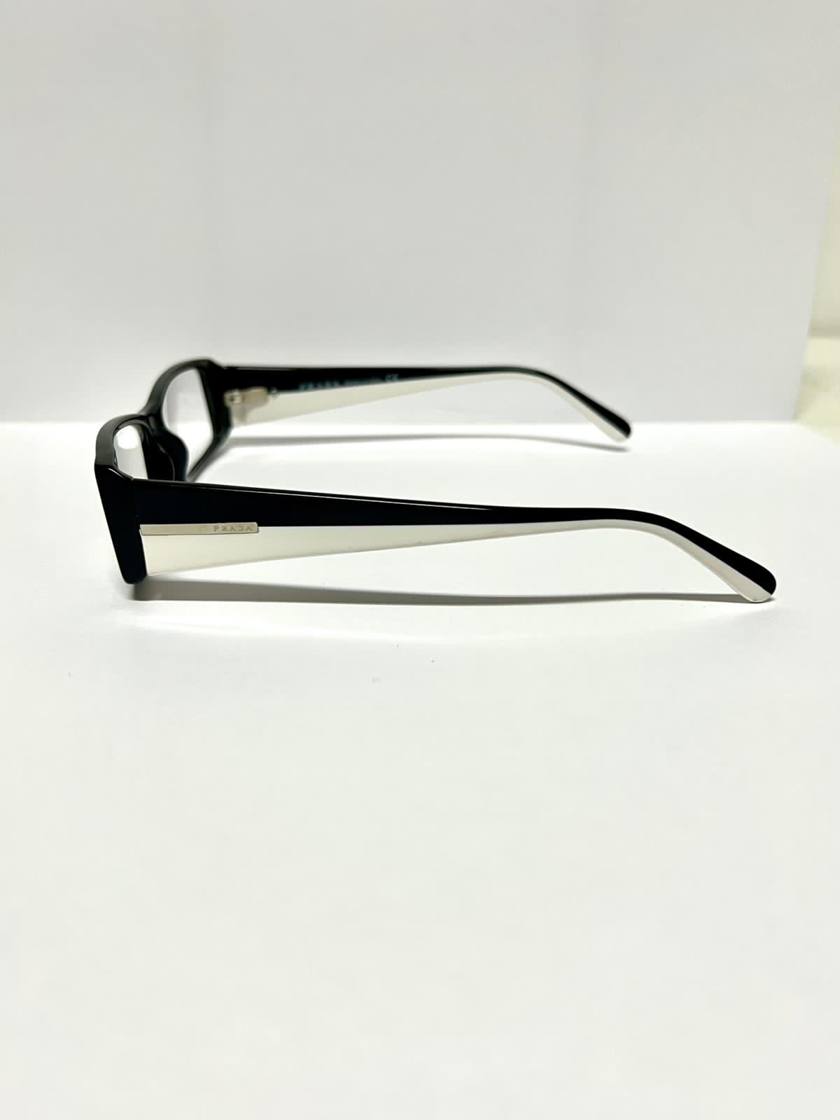 Prada VPR16H 7BH-1O1 occhiale da vista celluloide nero bianco asta